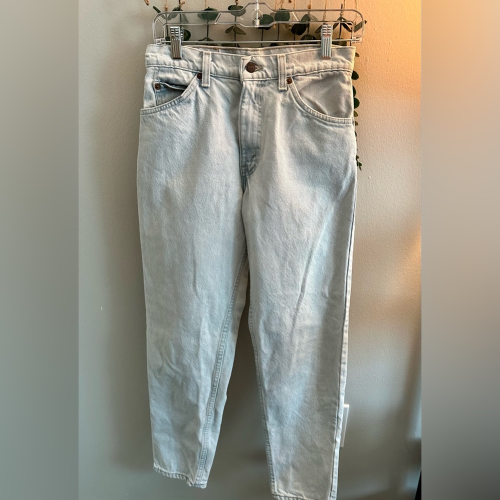 Vintage Levi’s 90s Orange Tab tapered leg 550 denim light wash blue jeans